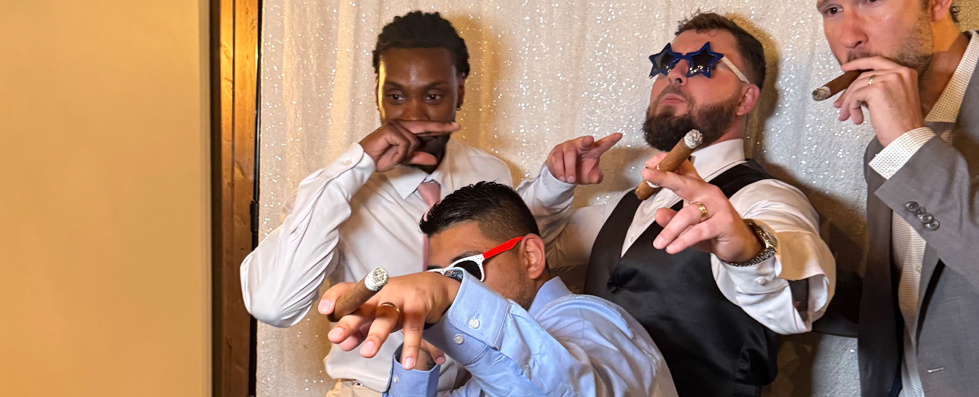 Photo booth rental Jacksonville FL — guests celebrating at a Jacksonville event with Footloose Entertainment